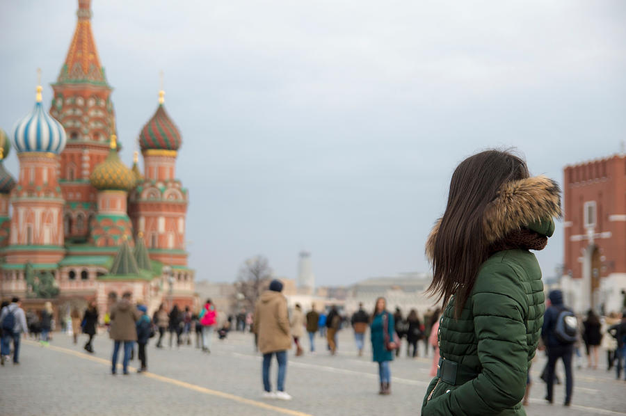 Side View Of Woman In Jacket Standing Against St Basil Cathedral Photograph by Mario Kristiani / EyeEm