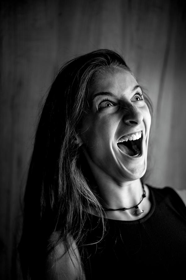 Side View Portrait Of A Teen Shouting Wide Open Mouth Photograph By Nick Paschalis Fine Art