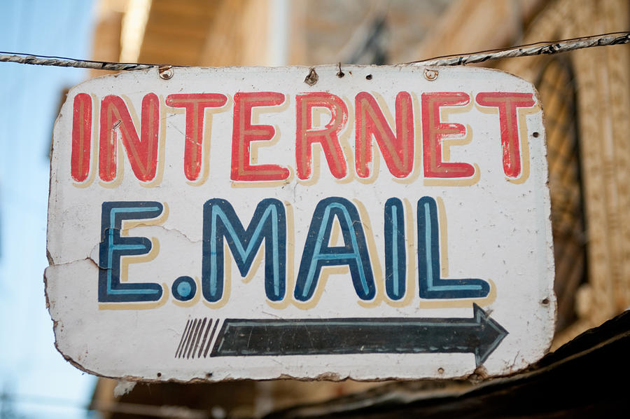 Sign painted with the words Internet and email Photograph by Code6d