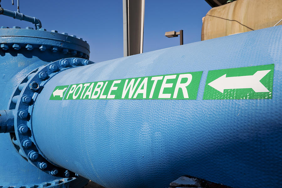 Signage on Large Water Pipe for Potable Water Photograph by TerryJ