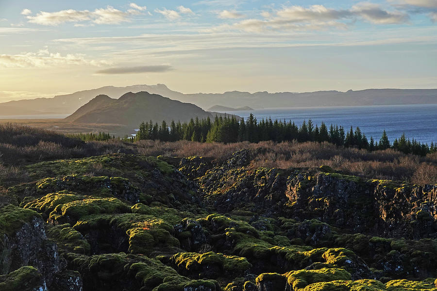 Silfra Pond at Sunset in Thingvellir National Park Iceland Photograph by Toby McGuire
