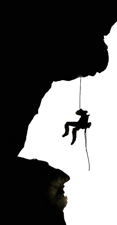 Silhouette of a rock climber on rappel #aYearForArt  Photograph by Steve Estvanik