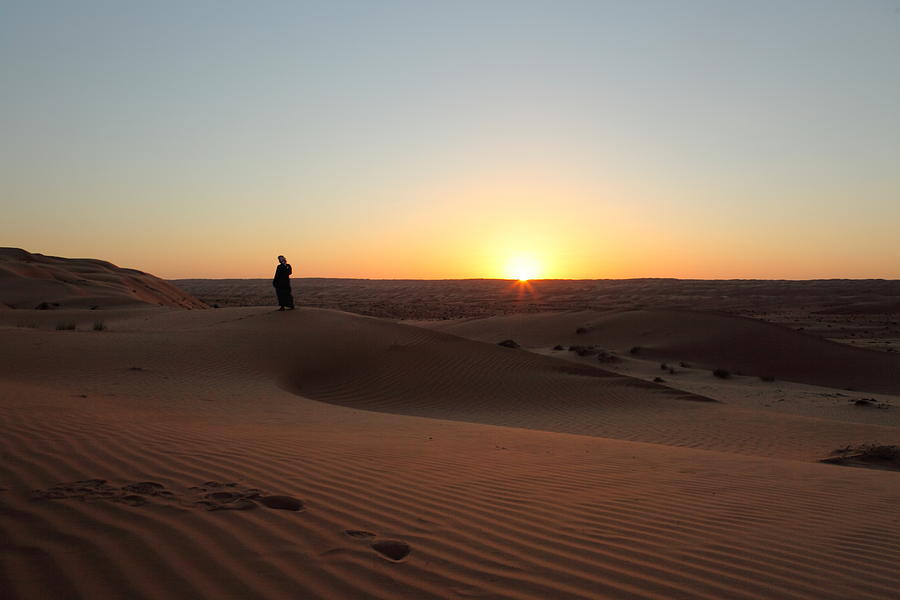 Silhouette of Arab man in desert at sunset Photograph by Ilias Katsouras jr
