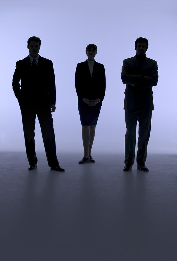 Silhouette of businesspeople Photograph by Comstock Images