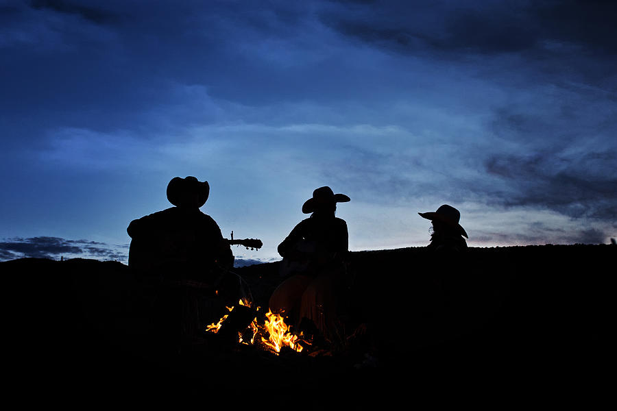Silhouette of Family At Campfire Listening to Guitar Photograph by Ktmoffitt