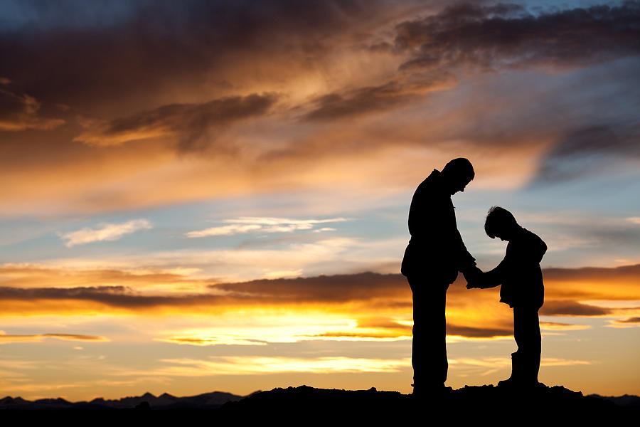 Silhouette of Father and Son Praying Photograph by ImagineGolf