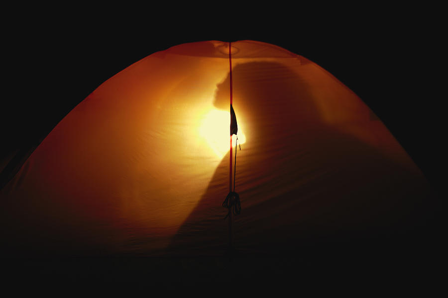 Silhouette of woman in tent. Photograph by Myshkovsky