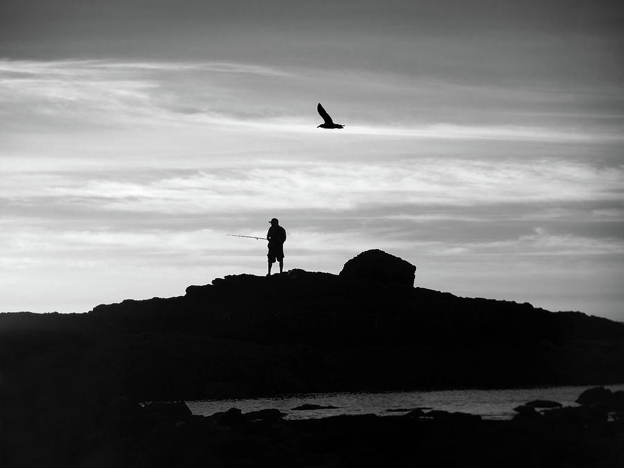 Silhouettes and the Sea Photograph by Joe Schofield