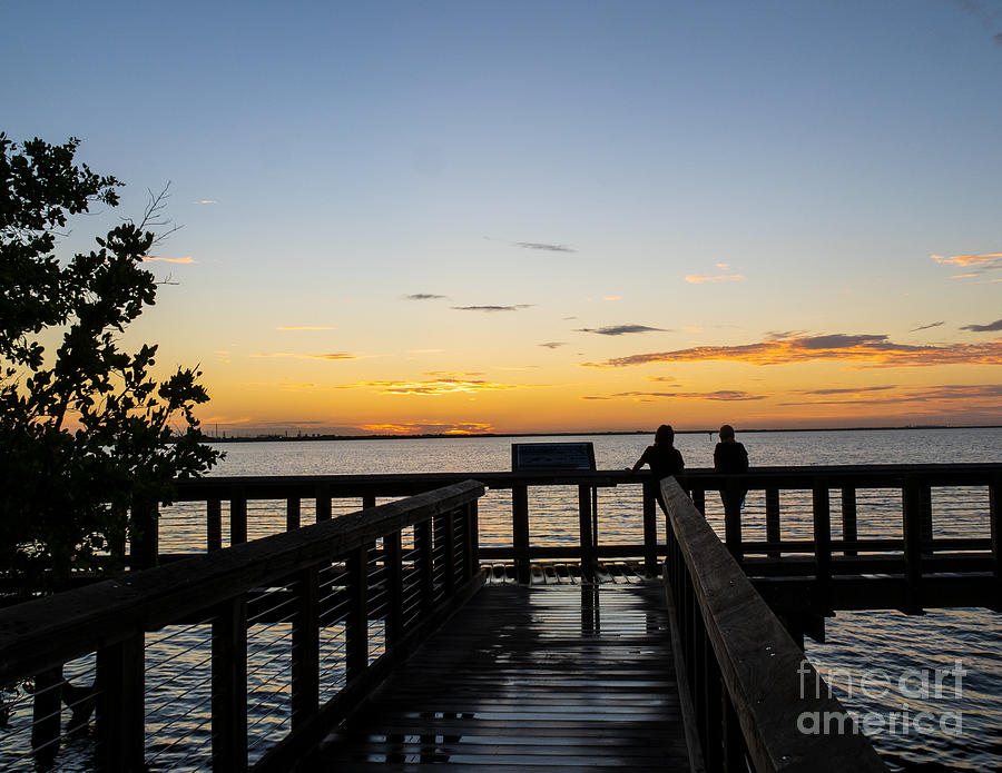 Silhouettes in Sunrise on the Boardwalk in Safety Harbor Florida Photograph by L Bosco