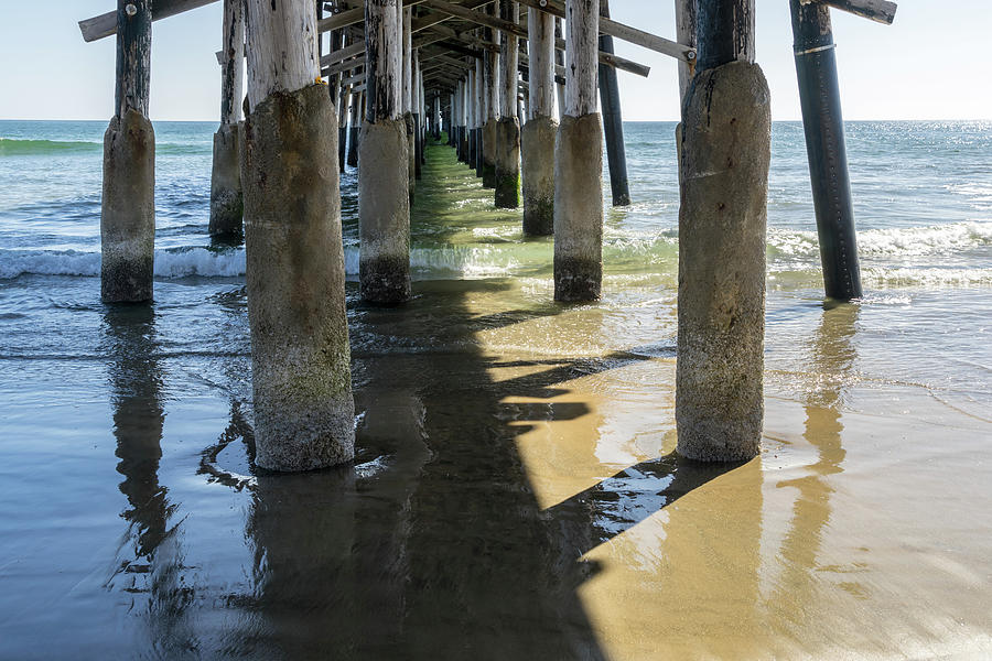 Silky Reflections - Under the Newport Beach Pier in Orange County California Photograph by Georgia Mizuleva