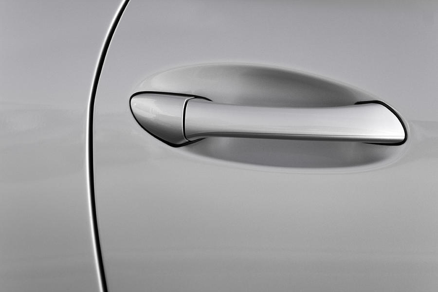 Silver car door handle Photograph by Deepblue4you