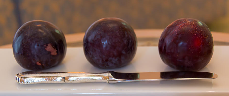 Silver Knife and Plums Photograph by Teresa Mucha