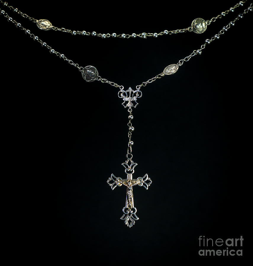 Silver rosary and crucifix with Christ Ancient XIX Photograph by Pablo Avanzini