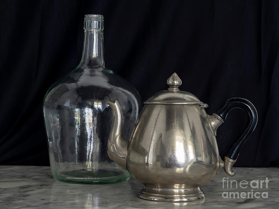 Silver Teapot and Demijohn Black Background Marble Table Photograph by Pablo Avanzini