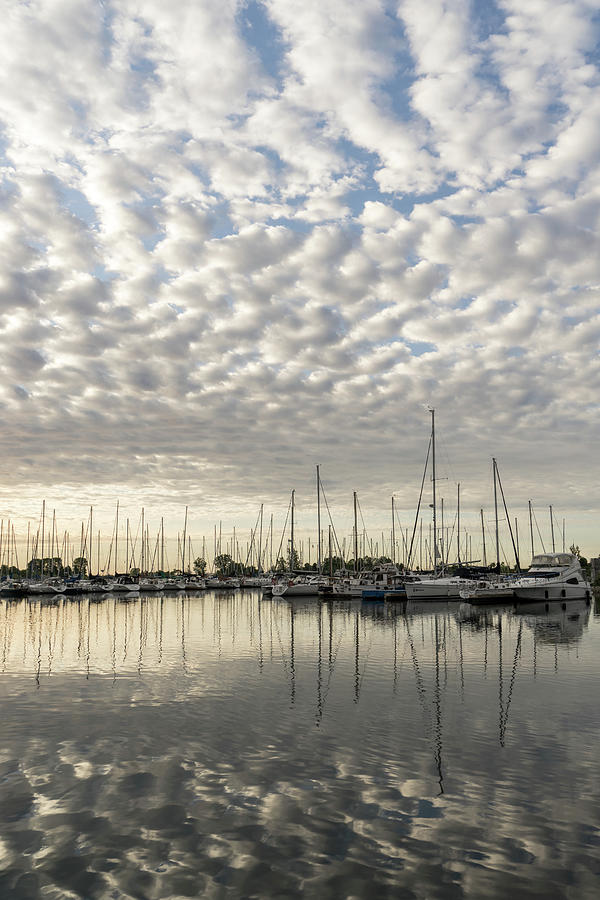 Silvery Mirror - a Peaceful Moment with Cloud Puffs and Yachts Photograph by Georgia Mizuleva