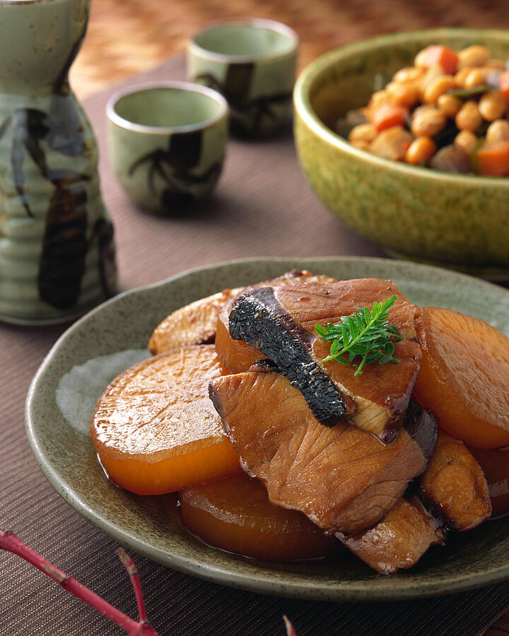 Simmered amberjack with Japanese radish Photograph by Mixa
