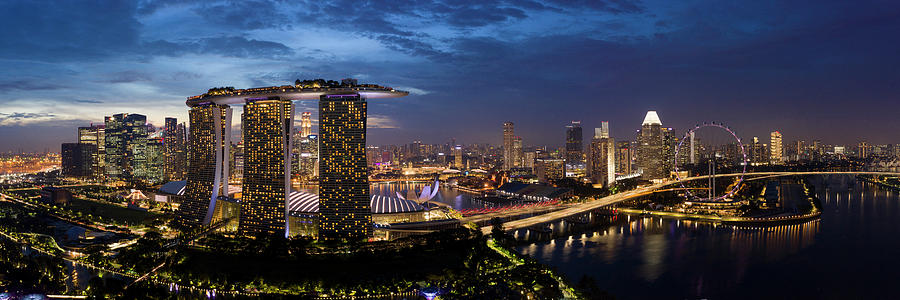 Singapore aerial cityscape at night Photograph by Sonny Ryse