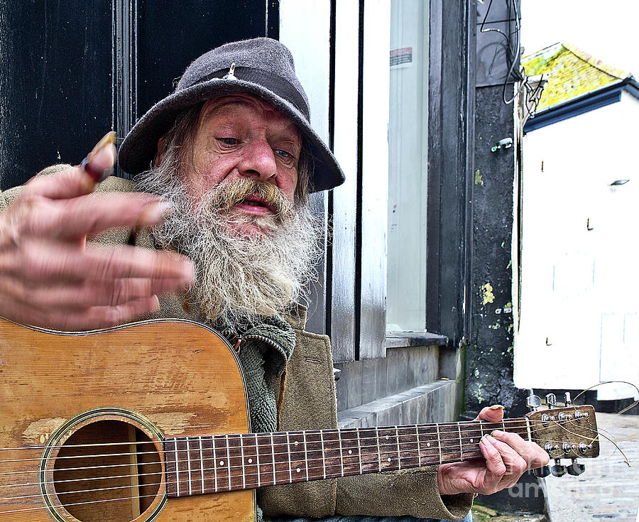 Homeless Singer Gives Guitar Street Concert Photograph by Tatiana Bogracheva