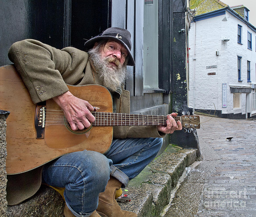 The audience - homeless singer gives guitar street concert UK Photograph by Tatiana Bogracheva
