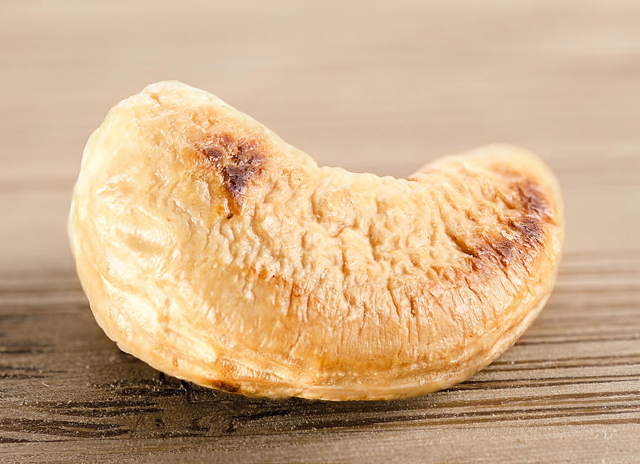 Single cashew nut  ( anacardium occidentale ) Photograph by Asergieiev