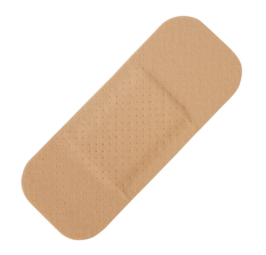 Single tan-colored Band-Aid on a white background Photograph by Andyd