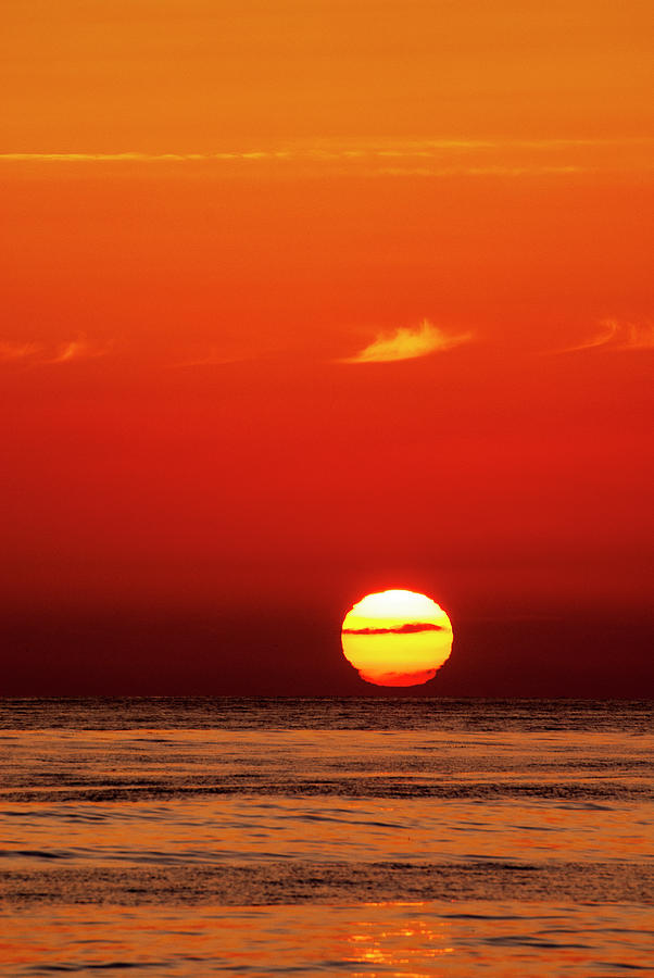 Sinking into the sea Photograph by Thomas Kryton - Fine Art America