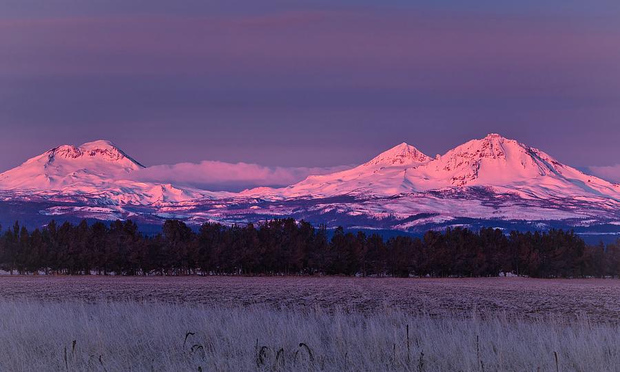 Three Sisters Mountains with Alpenglow  Photograph by Lynn Hopwood