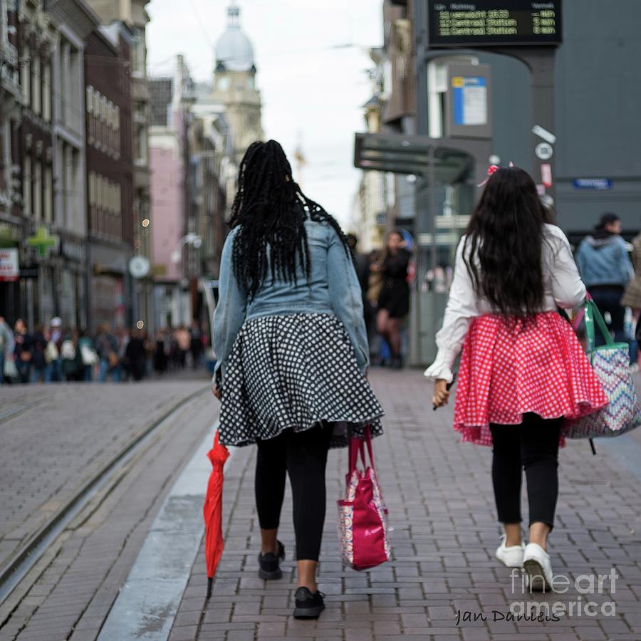 Sisters walking in Amsterdam Photograph by Jan Daniels