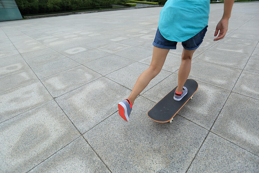 Skateboarder Skateboarding At  City Photograph by Lzf