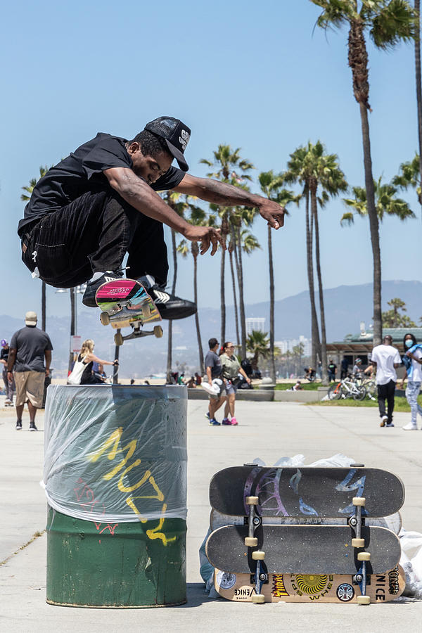 Skater in Venice Beach Jumping Barrel  Photograph by John McGraw