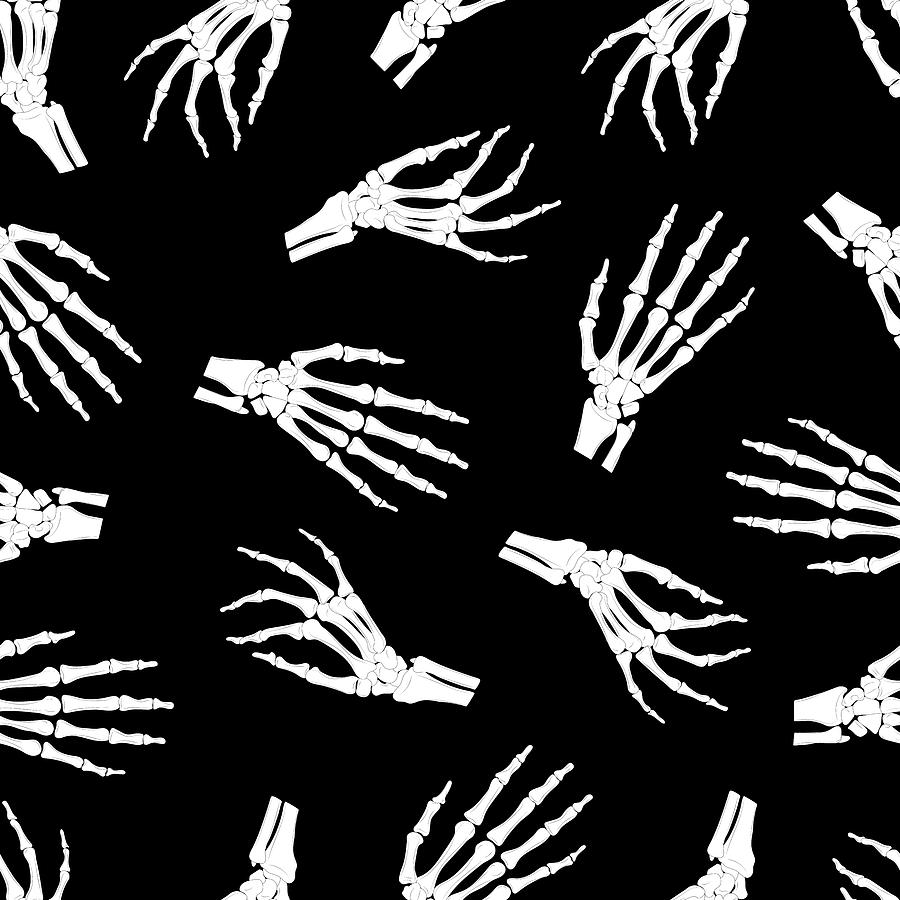 Рука скелета на черном фоне