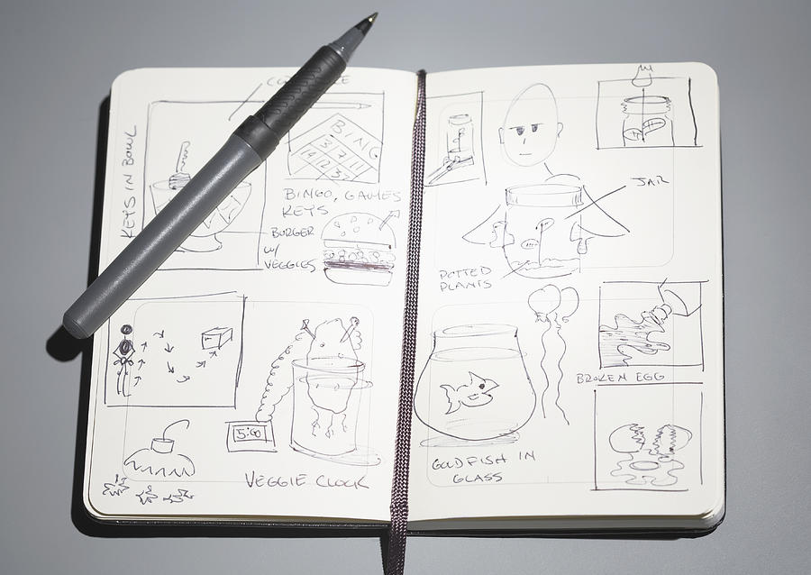 Sketches in open notebook Photograph by William Andrew