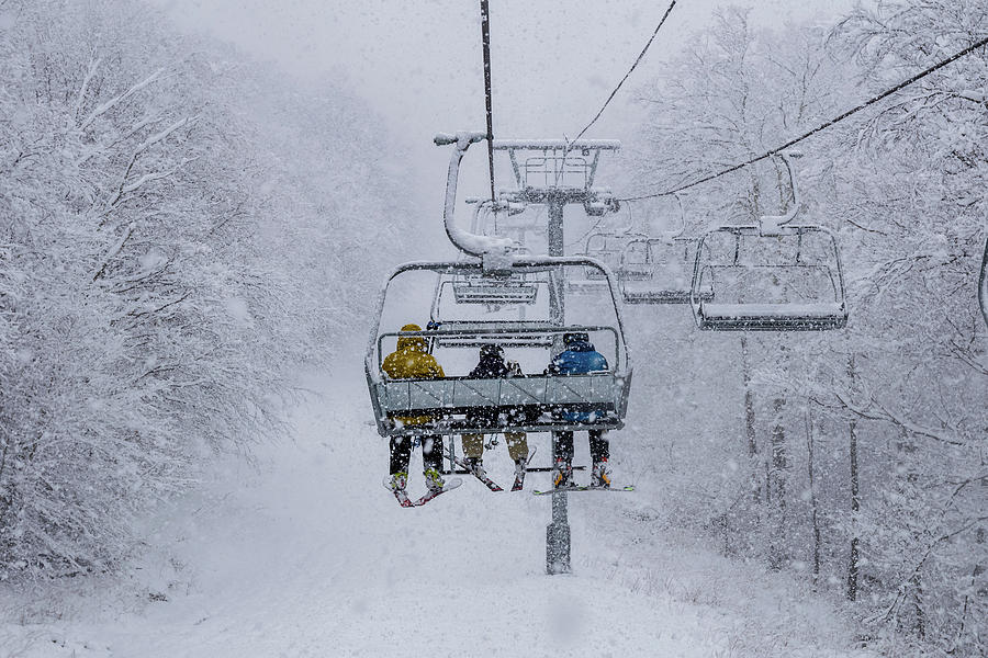 Skiing Chairlift in a Storm Photograph by Chad Dikun