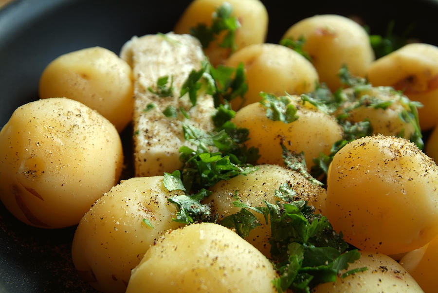 Skillet Full of New Potatoes with Parsley and Butter Photograph by Stephanie Phillips
