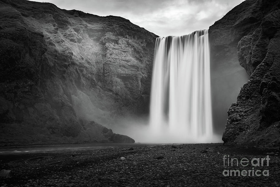 Skogafoss waterfall in Iceland, black and white Photograph by Delphimages Photo Creations