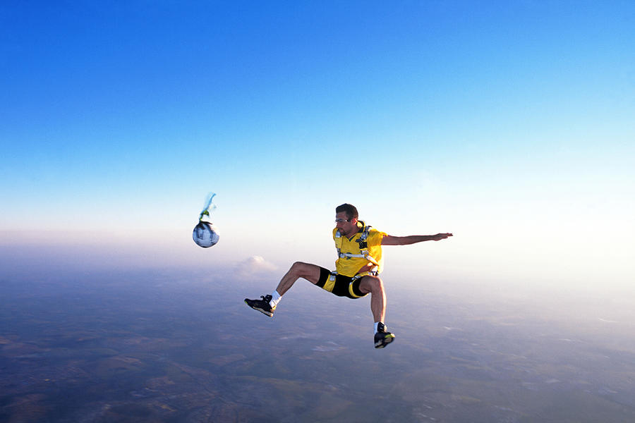 Skydive football Photograph by Rick Neves