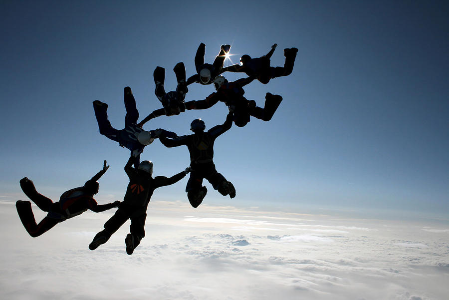 Skydiving team Photograph by Graiki