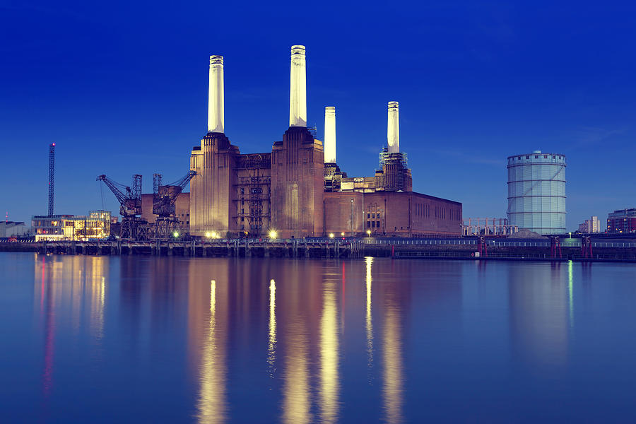Skyline of Battersea Power Station with lake reflection Photograph by _ultraforma_