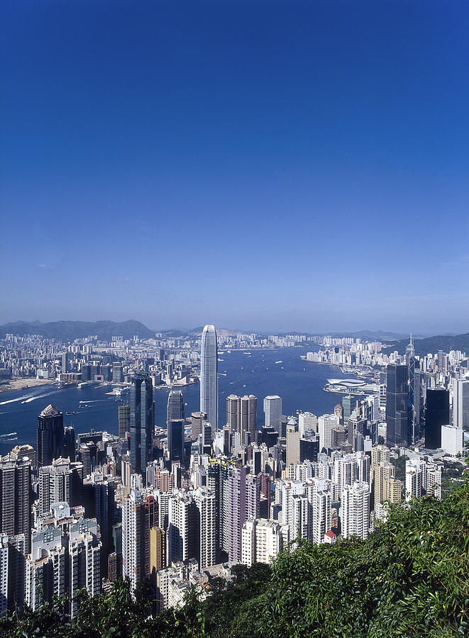 Skyline of Hong Kong seen from Victoria Peak, China Photograph by Dallas and John Heaton