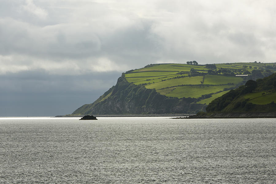 Skyline of shoreline of County Antrim Photograph by Allan Baxter