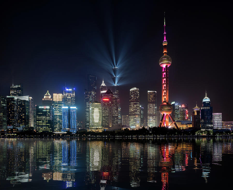 Skyline of the city of Shanghai at night Photograph by Steven Heap
