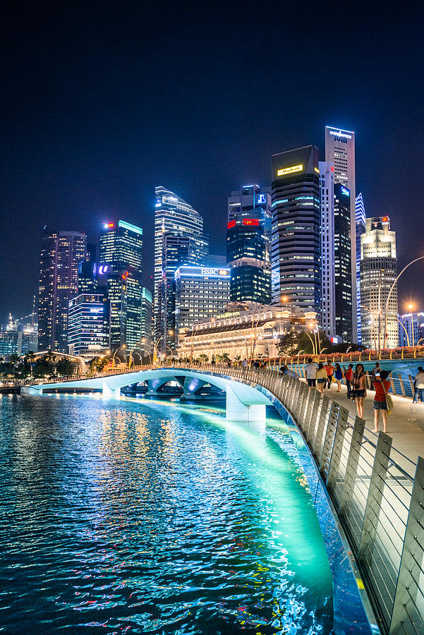 Skyline of the Singapore downtown at night from the marina Photograph by Franckreporter