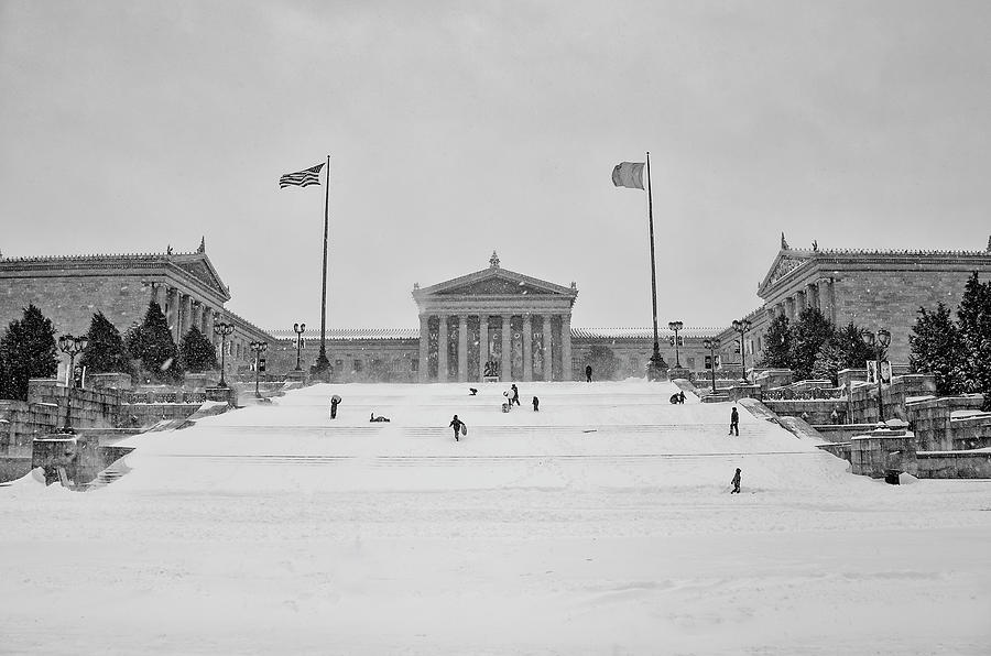Sledding on the Philadelphia Art Mesum Steps in Black and White Photograph by Bill Cannon