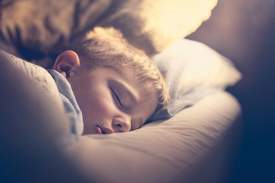 Sleeping boy Photograph by Rebecca Nelson