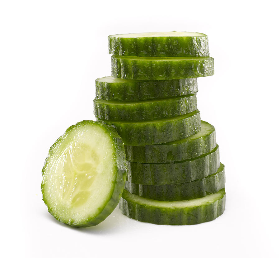 Sliced Cucumber in Stack Photograph by Rbozuk