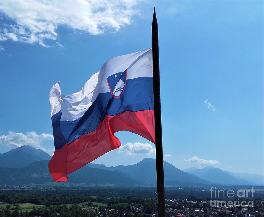 Slovenian Flag Over Lake Bled In Front Of Mountains Photograph By Pis Ces