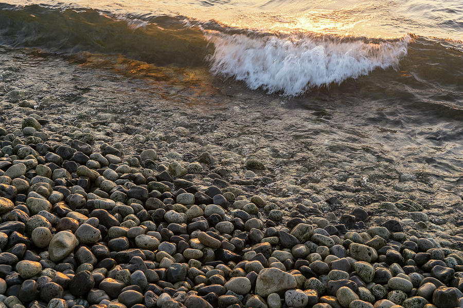 Slow Motion Surf - Backlit Wave and Polished Pebbles Photograph by Georgia Mizuleva