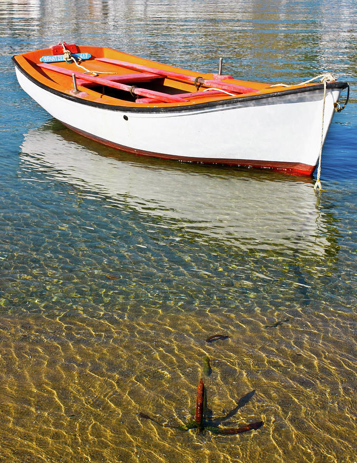 Small Boat Anchored in Mykonos, Greece Photograph by David Morehead