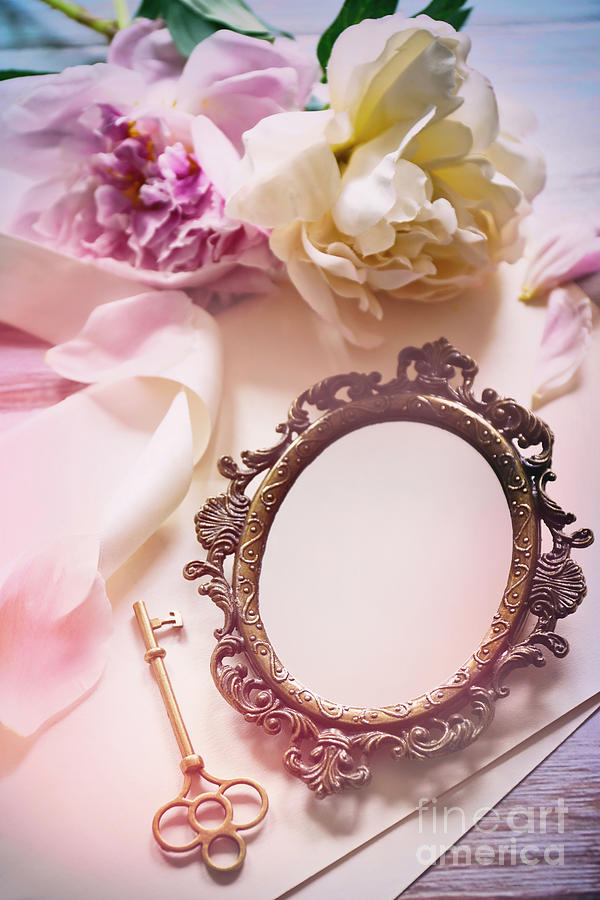 Small brass mirror with flowers and key Photograph by Sandra Cunningham