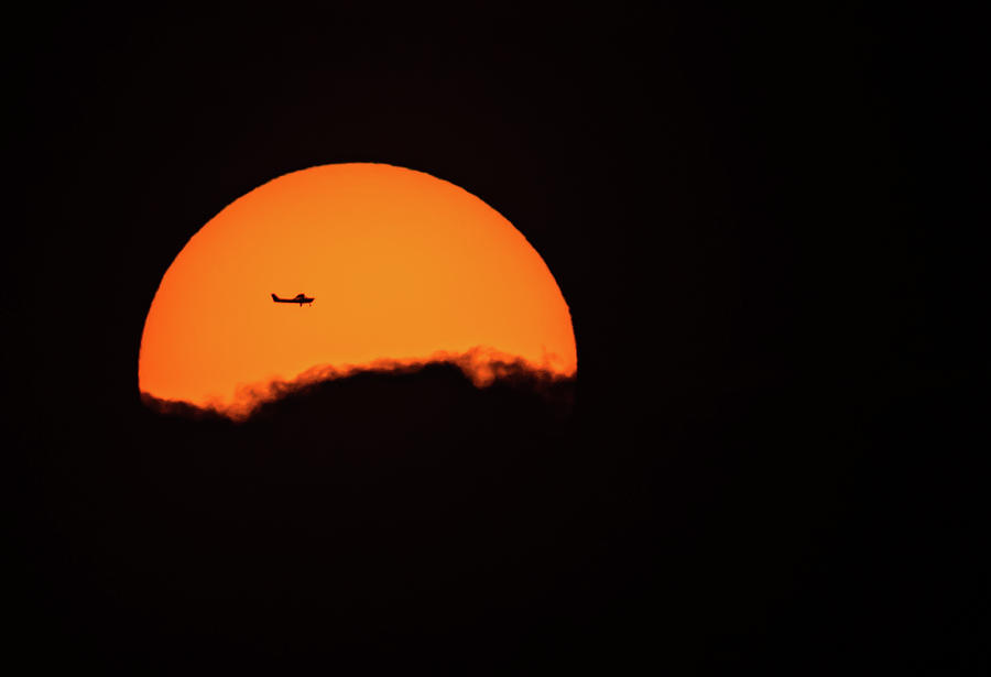 Sunset Photograph - Small plane silhouetted against the Sun by EZ Lorenz Imagery